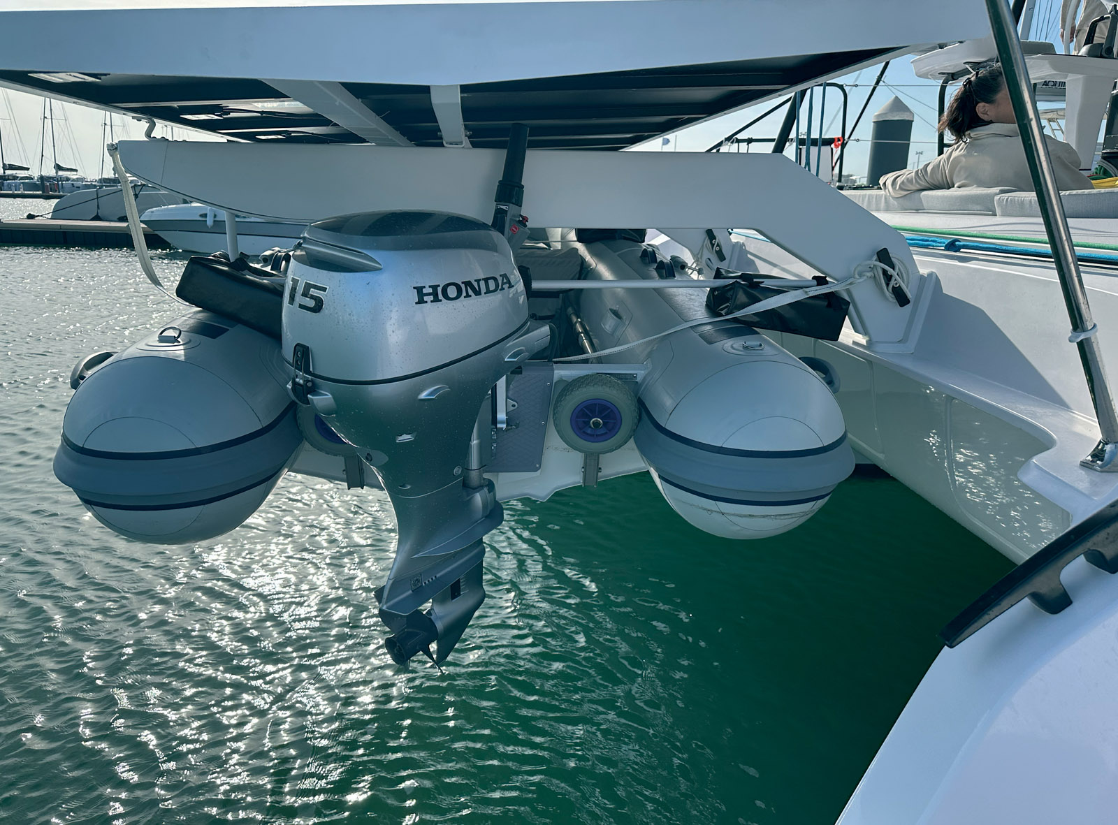 Perfectly stowed under the arch, the dinghy is launched quickly using a single control line.