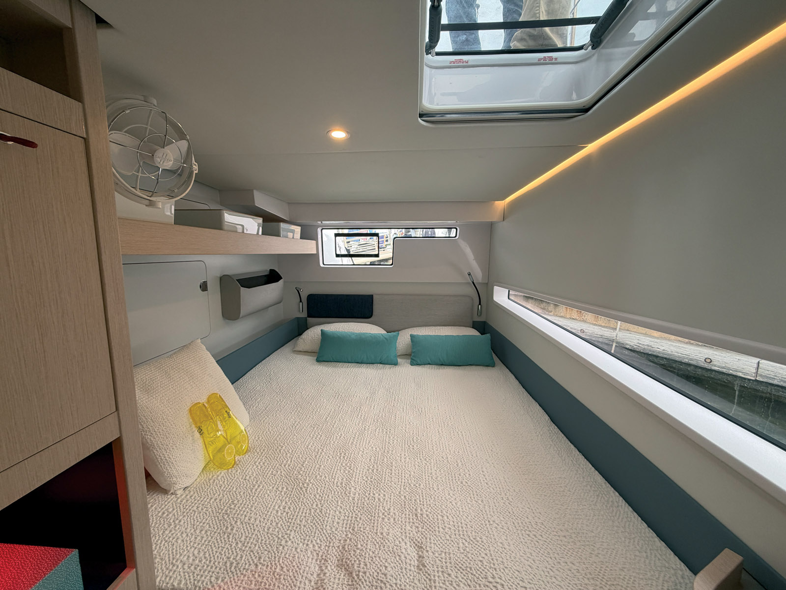 Despite the intentionally narrow hulls, the aft cabins feature  queen-size berths, ample storage, and plenty of natural light.