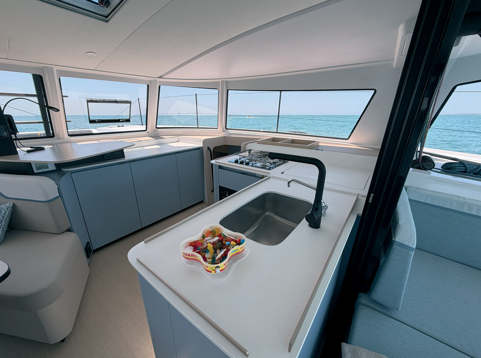 Compact yet highly functional, the L-shaped galley offers ample storage and enjoys excellent access to the cockpit.