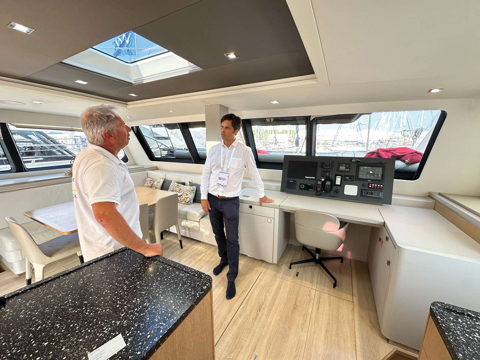 Romain, pictured here chatting to Emmanuel van Deth, represents Globe Sailing in Europe. This brokerage company, also based in Latin America and Florida, specializes in supporting  long-distance, blue water projects.