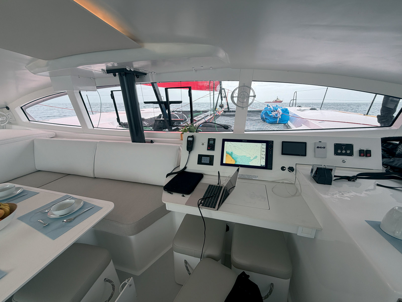The sleek, functional chart table is complemented by electric controls  for the engines - a real bonus! But it’d be nice to have a proper seat.