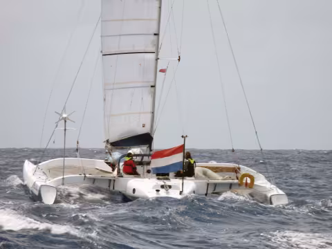 Depending on the ensign he or she is flying,  does that mean a sailor favors one anchorage over another?  Having sailed further than most, Graham seems to think so!