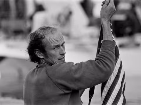 ©AFP / Jean-Pierre Prevel - Mike Birch aboard his Dick Newick-designed trimaran in Saint-Malo, France, on November 4, 1978, the day before the start of the very first edition of the Route du Rhum.