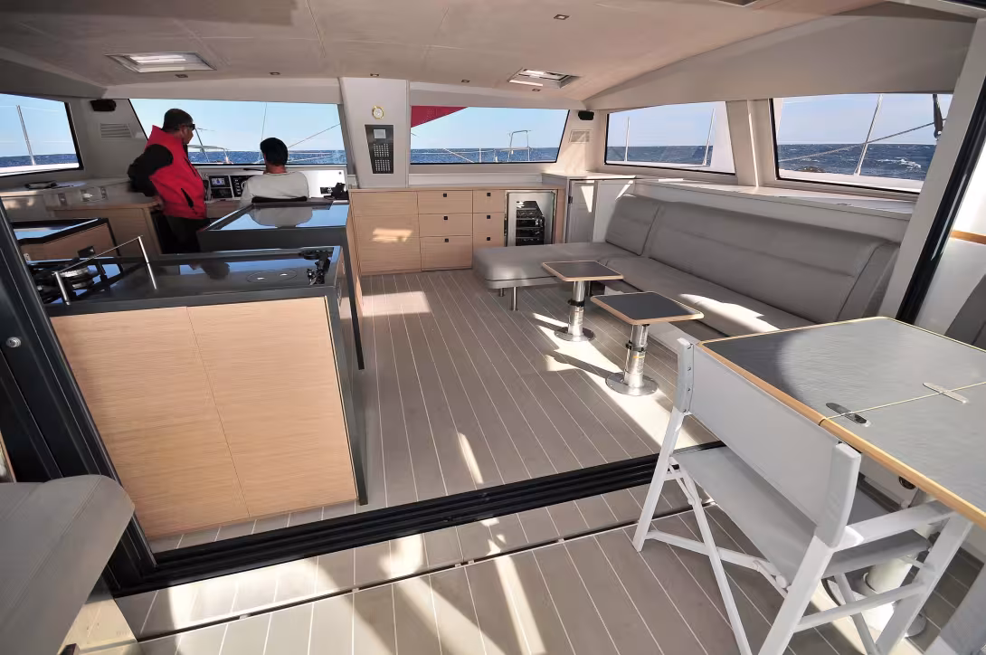 The panoramic view from the 62 is exceptional.  The moveable bulkhead disappears almost completely behind the galley
