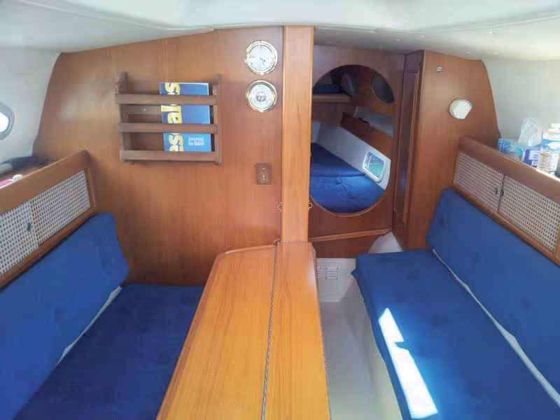 The saloon is not wide (compared to a cat) but everything is in its place; good ergonomics and many clever accommodation features make it very welcoming for cruising.