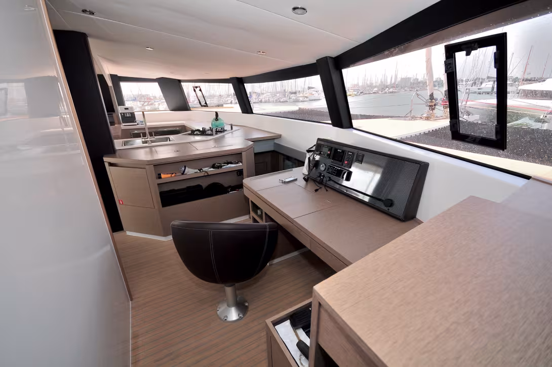 The galley is a work of art! The chart table, away from the general traffic, constitutes an enviable watchkeeping position