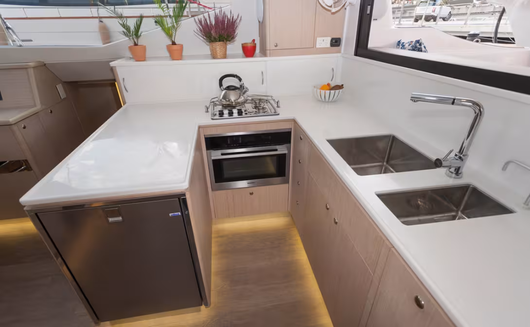 A very well designed galley, for living with every day and in all weathers!  The connection to the outside through sliding windows is original and very pleasant to use 
