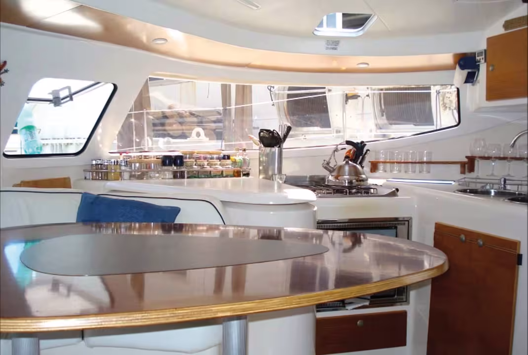 Curvy and convivial, the saloon is adjacent to a functional galley.