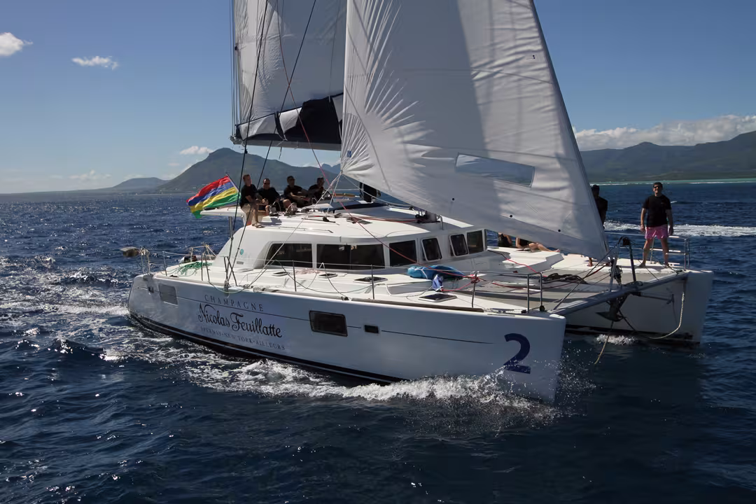 Two innovations on deck: the builder has provided a forward cockpit and a raised steering position.