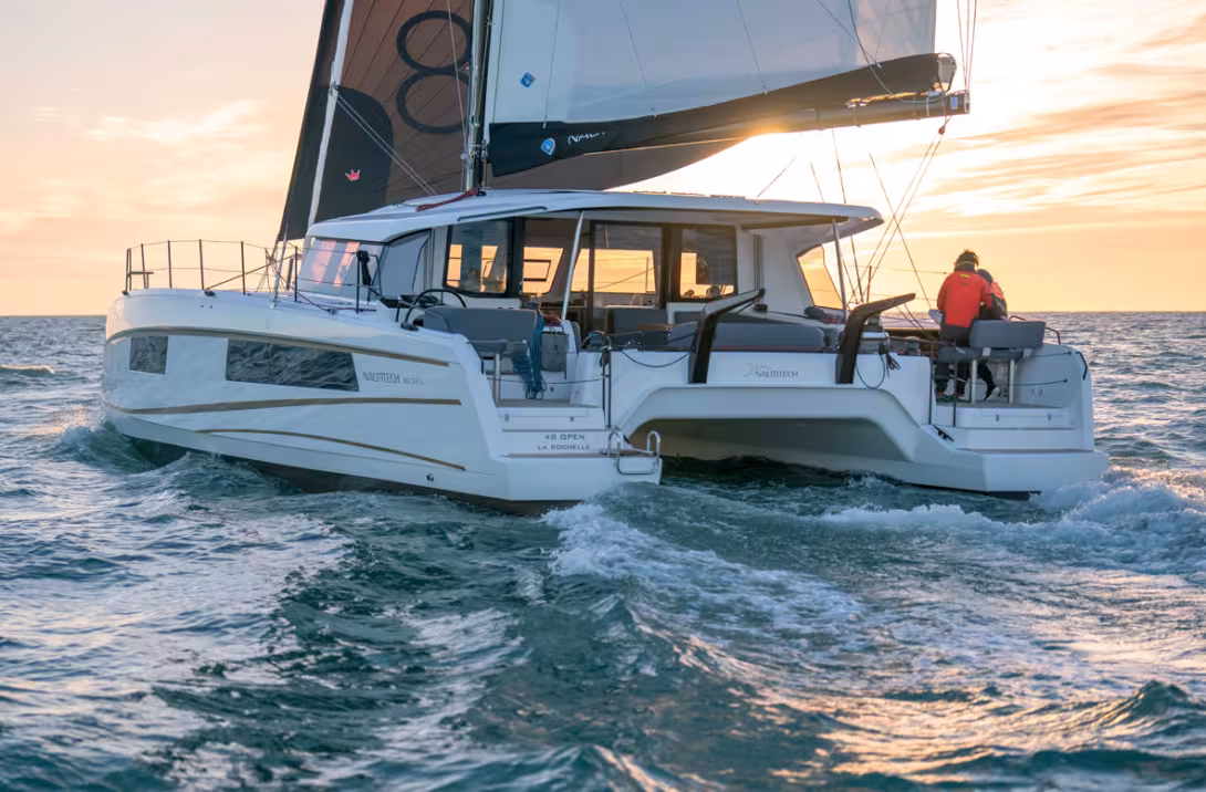 The swirls in the water at the stern of the two wide sugarscoops are significant and could lead you to believe that the 48 is dragging water – but it’s nothing of the sort, it’s just that the catamaran goes very fast!