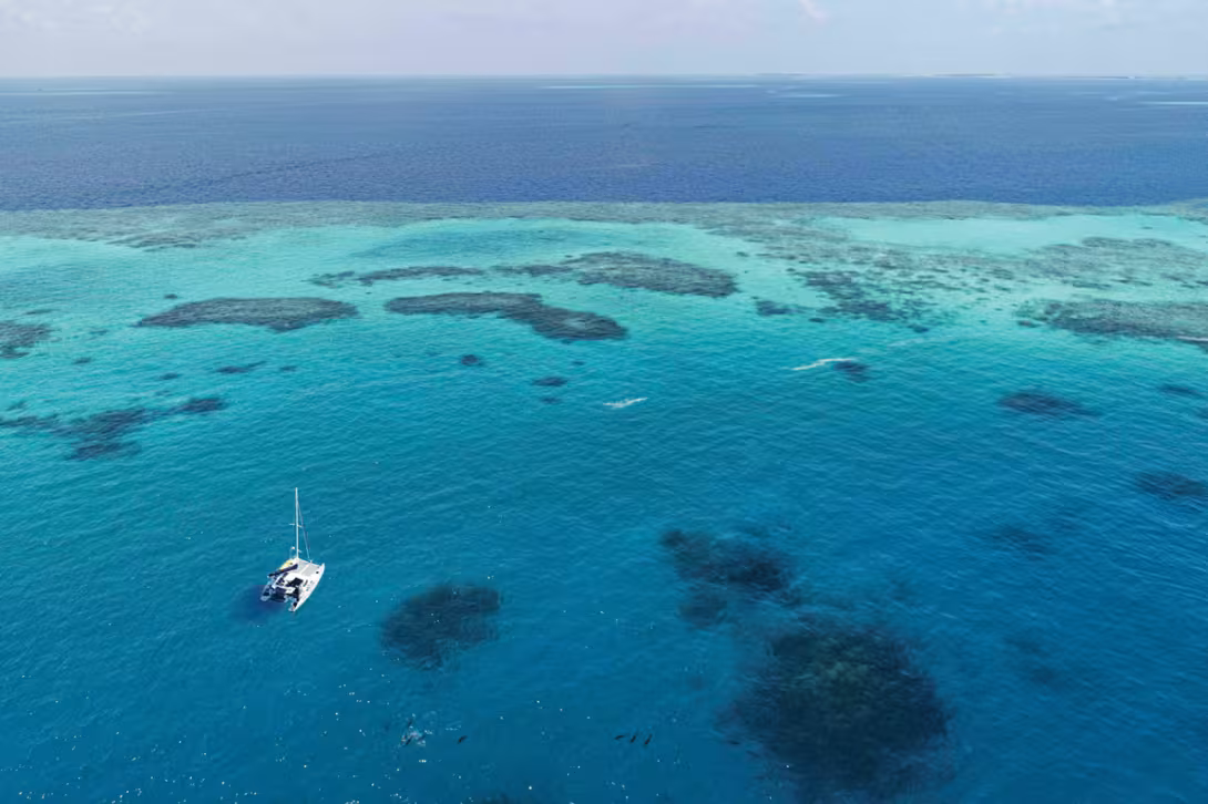 The anchorage looks very open but is in fact well protected by the coral reefs.