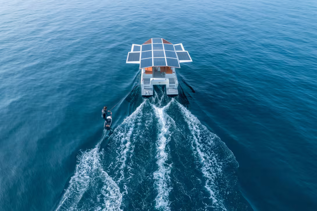  “Slow sailing” doesn’t mean you can’t have fun, as you can see here with this towable surfboard.