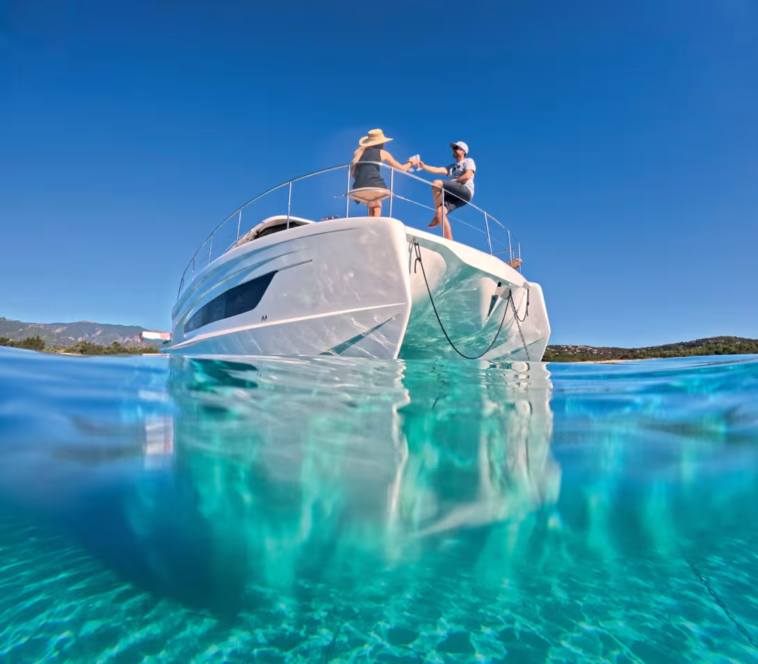 The Aventura 38 Sedan in the anchorage  off Saint-Cyprien beach, north  of Porto-Vecchio, Corsica.  
