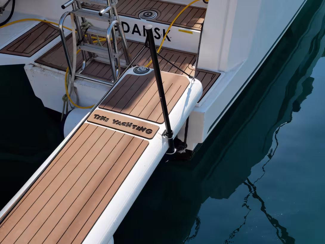 The wide aft platforms of modern multihulls provide excellent support for the gangway.
